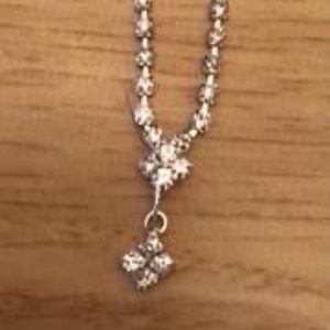 Silver necklace and earrings